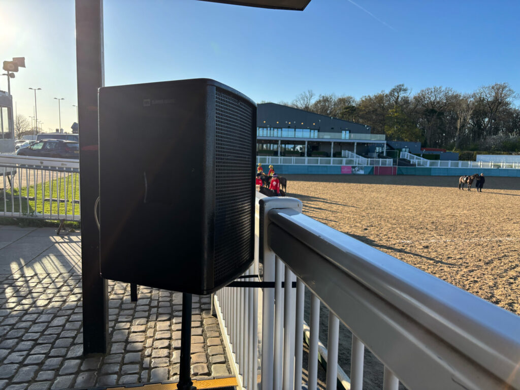 PA speaker setup overlooking equestrian arena at Dallas Burston Polo Club - JET event equipment hire Warwickshire