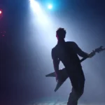 live performance with fog machine and stage lighting effects