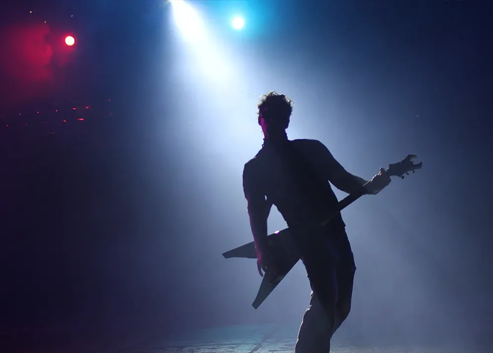 live performance with fog machine and stage lighting effects